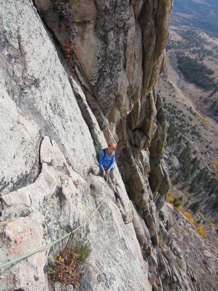 Looking back from the final slab pitches to the finishing boulder problem.