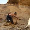 Getting in position to clip the 2nd bolt. In my opinion, this is the crux of the route.