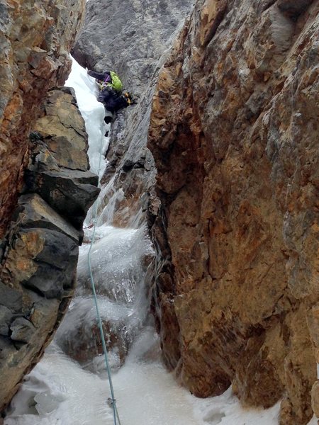 Kevin Hansen, grappling with the "snow chockstone" which is mostly hidden from view.