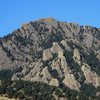 The rock on the East Face of the South Summit of Green Mountain appears broad behind the Dinosaur Mountain crags. 