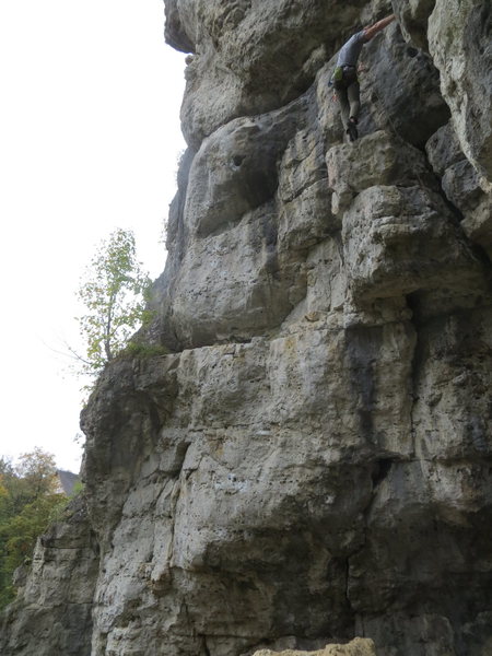 Café Kraft follows the line white stone in the center of the photo.  The climber is on Reinhard Holz GW.