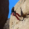 Rappelling over the overhang on "Endymion."