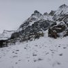 Hike through the notch to gain the bench and the base of the route.