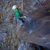 Cool, multi-sided arête leads to a tricky mantle-type move at the top. November 2014. 