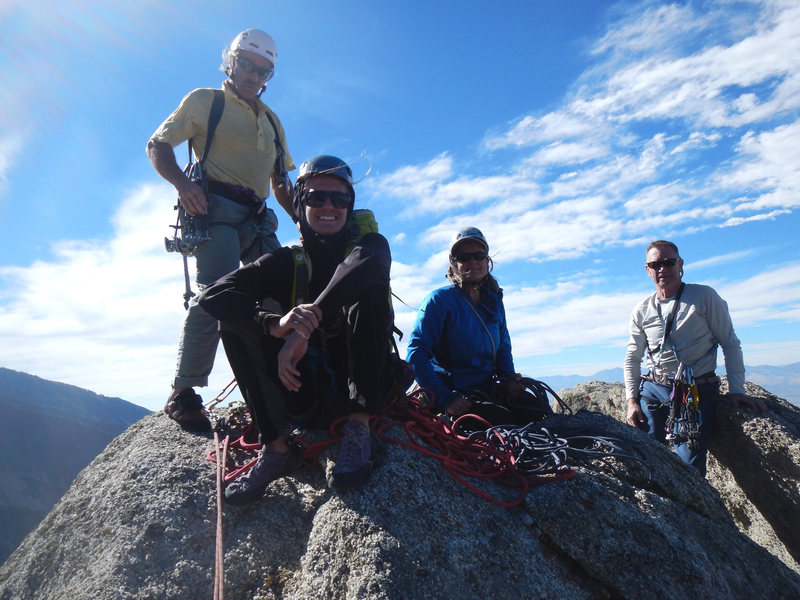 From L to R: Rick, Hayden & Evelyn Wyatt and Les Ellison. Windy day on the summit of Reptile Ridge, Pawn area.