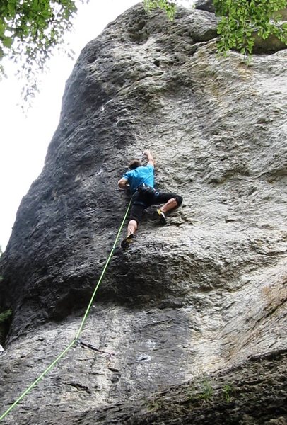 Bouldery pocket climbing, beginning the crux sequence of Ghettoblaster.