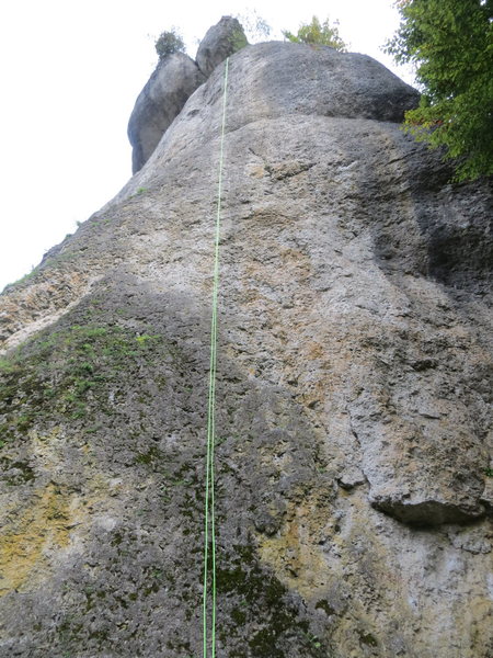 The rope is on Katalysator, but the line climbs a bit right of where the rope is, through the white and orange-speckled stone.  Auerbacher Weg is immediately right, beginning on the far right side of the white streak, and finishing in the steeper gray stone above.