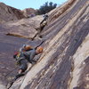 where Frogland and Bourbon Street split. climbers above on frogland. climber in foreground about to climb the crux 2nd pitch crack