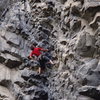 Eli on his route "Bat Crack" 5.11 at the zoo.