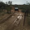The first gate off the main road.