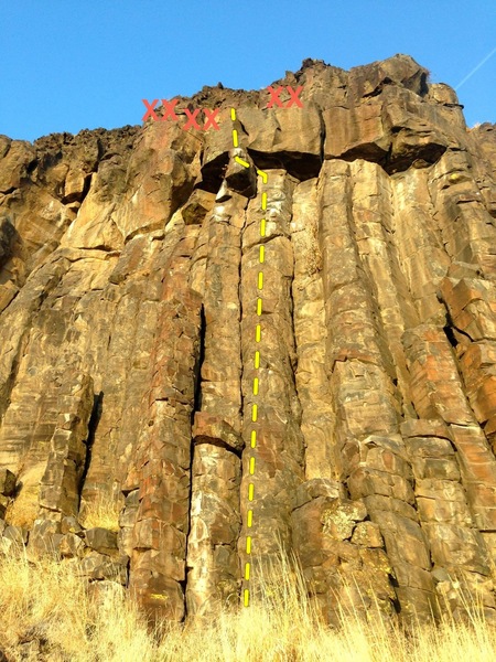 The route.  Climb the hand crack until you are under the roof.  Follow the crack up and left, over the roof and a bulge, to the chains.  You can see a bolted prow with a hard sport route to the left.