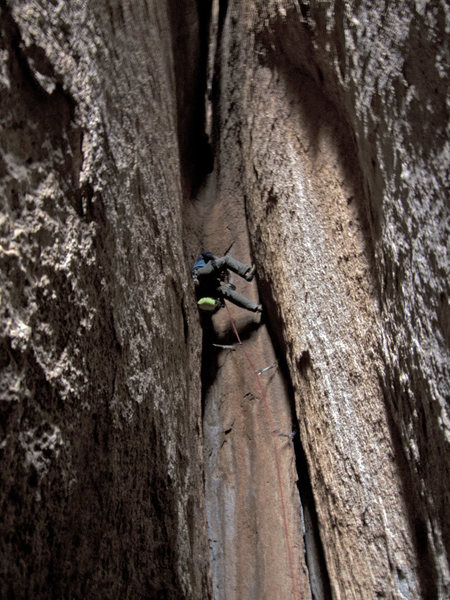 Climber on the chimney pitch