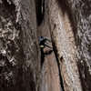 Climber on the chimney pitch