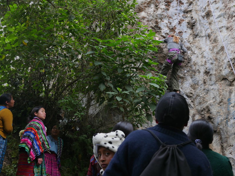 Local pilgrims spectating with curiosity.