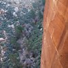 Hanging out on the P4 belay ledge on Dark Shadows, 5.8, Red Rocks NV