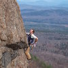 Will Roth scopes the crux runout.