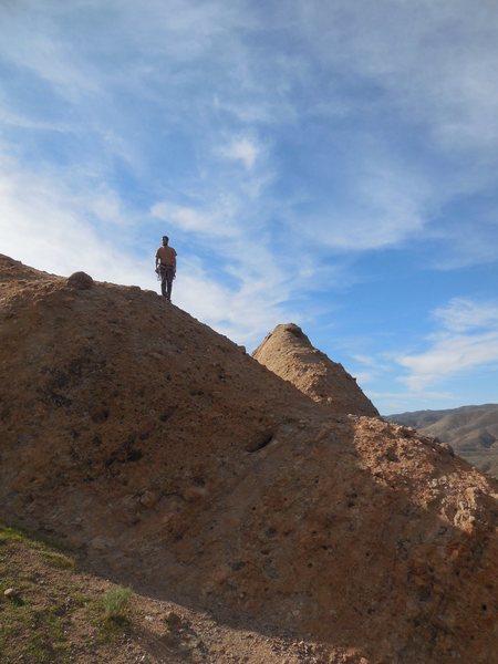 A climber enjoying the Trenchtown Slabs.