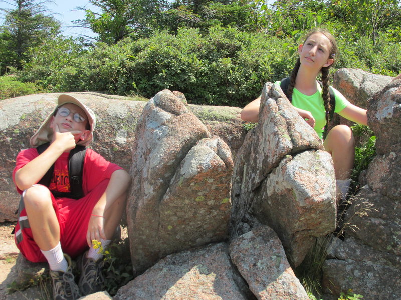 This photo is the cover page of, ROCK FRIENDS OF ACADIA - a Treasure Hunt for Children and Adults, 2015 written by our friend Ellen Dohman who lives next to Acadia National Park. Zachary and Alexa are imitating these two rock friends, "the codgers" as they sit there contemplating the weather for the day. You can purchase a copy of this book at Sherman's Book Store in Bar Harbor Maine.