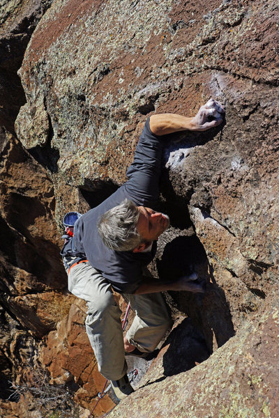 JJ pulling through the final crux moves on the FA.