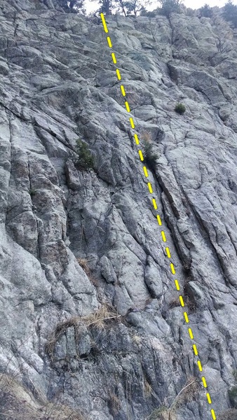 In the right portion of this pic, Creeping Obscurity climbs a shallow, left-facing double dihedral up to the righthand of two tiny Douglas firs. Continue upward in search of pro, while trying to avoid loose rock.