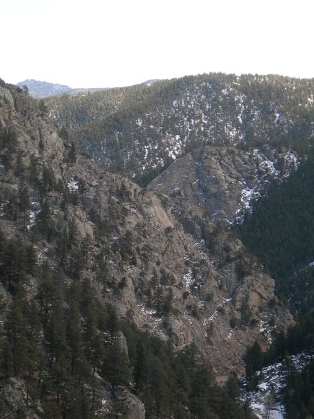 Pitch two of Inagodadavida climbs the clean, light-colored slab in the center of the photo. Pitch one lies on the darker slab just below.  In this perspective, Eagle Rock lies behind and to the east of Stoner Slab. The Annex and Bitty Buttress protrude into the upper left of this landscape. One Shoe Makes It Murder is visible at lower right.<br>
<br>
Photo by Leo Paik.