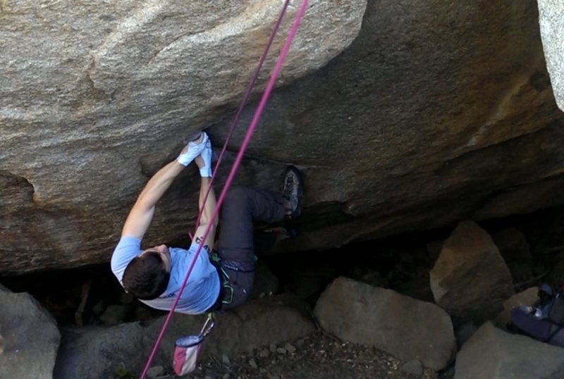 KC cruising through the opening sequence.<br>
<br>
Route follows the obvious jugs up and then over the fun mantle to the top.  Chockstone giant boulder on the right is off!