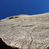 Looking up the face of Wind with the locations of the two bolts circled.