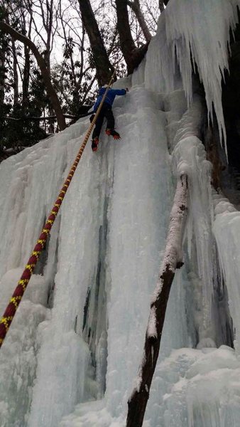 Same TR route with climber on rope. Slight ice bulge near top of first vertical section.