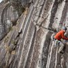 Pano of Choas in the P2 crux. Undercling-high-step over a tricam, classic Looking Glass. Photo credit goes to Kyle Jones at bluewallphotography.