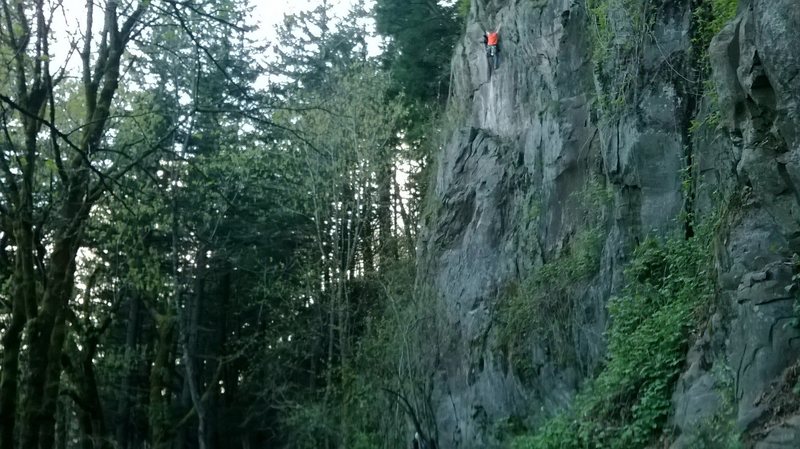 Climber on Happy Endings at the crux.