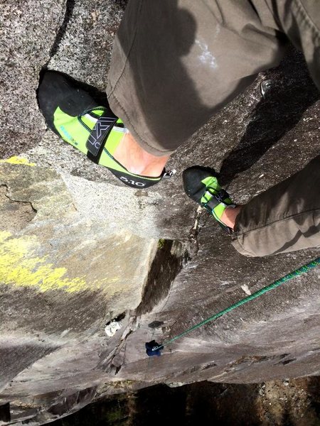 looking down after pulling the laybacks above the flare high on Town Crier. note the steepness of this pitch as my bag is hanging away from the belay.