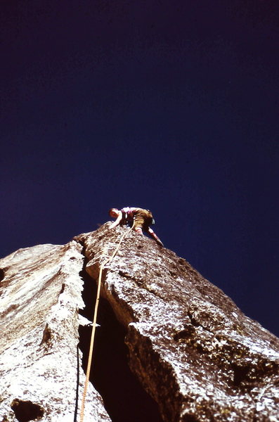 Peter leading the highly featured second pitch of "David", 1973: knickers, klettershoes, tied in w/bowline on a coil, no chalk, all nuts & ovals. The gear is sooooo much better now, right?