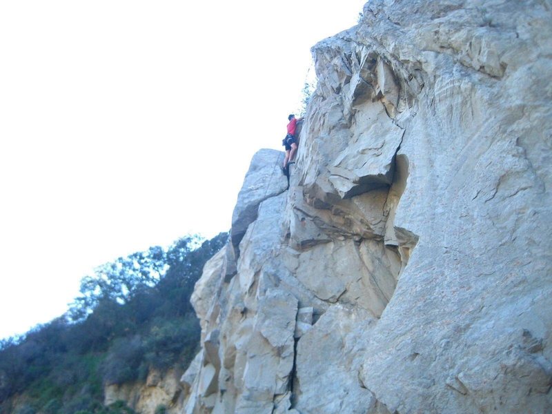 This climber went too far left and is making his way back right to the anchors for Original Route.