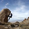 Bouldering high above the emptyness, Lone Mountain