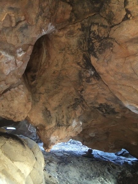 Starts in the deep back, lower right of this photo on underclings. Continues up left, through the hueco.