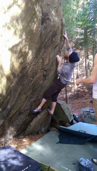 Moving up the arete on pinches