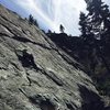 Erica cruising up an "unknown" 5.8+ at the Fun House at Bowman Valley. 