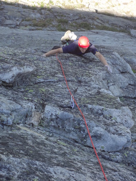 Climbing into the jugs near the end of pitch 2