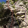 Good Overall View of the right side of Faint's Roof Area<br>
From L-R:<br>
Blood and Pus (on left side, follow streaks up to roof, pull at small crack)<br>
Ounce of Perception (thru two v-notched roofs)<br>
Pound of Obscure (from upper ledge, climb up/left following streaks passing left of a bulge)