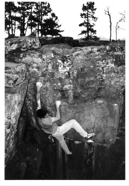 Mike Gasch on a variation on the Block Roof boulder, 1999.