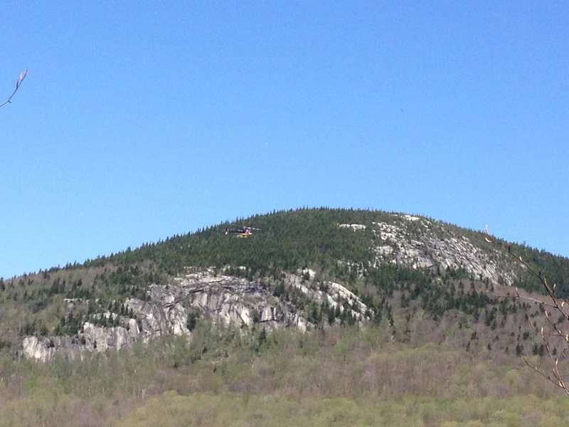 Mt. Oscar's lower Main Wall and upper 'Bretton Woods Ski Area West Wall'. Photo also shows a helicopter ferrying loads to Zealand Hut.