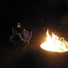 smiling whilst shivering, when the weather starts to take a turn for the worst, at least we have fire! indian creek camping mid april 2014