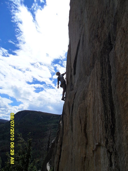 Kurt Strobel climbing high on Boston Peak.