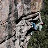 Colin unloading before the final boulder problem which guards the anchor on Burning Point .12b, The Peaks Crag.