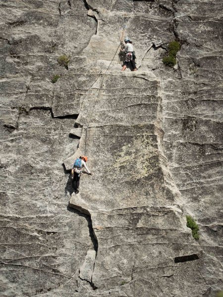 Finishing the first pitch.  Note the anchor up high in the crack, rather than the flake.