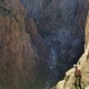 Jay enjoying the final belay ledge before the rim.