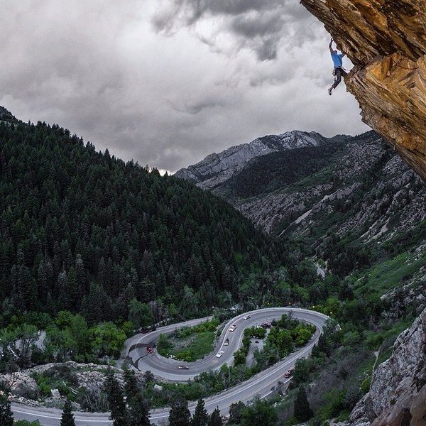 Pulling the lip at the end of the amazing S-Curve Overhang, 5.11+, Big Cottonwood Canyon.