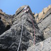 Starting the steep arête.