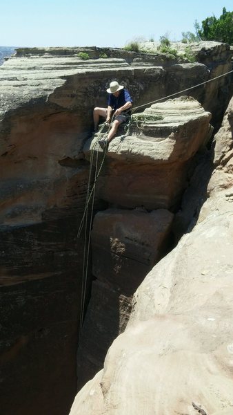 Setting anchors for top rope on top of "Warpath". Tied off to boulder found about 20 feet away then put a figure 8 on a bite with biners to run top rope through.