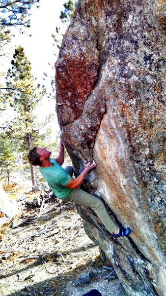 Luke Kretchmar getting established on This classic arête.